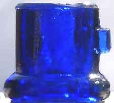 Cobalt blue side tab lightning rod insulator